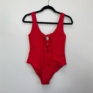 Ganni lace up recycled nylon blend one-piece swimsuit